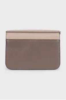 Beige leather bag with a 3D print