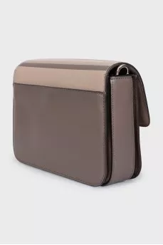Beige leather bag with a 3D print