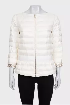 White quilted down jacket with decorative sleeves