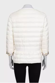 White quilted down jacket with decorative sleeves