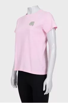 T-shirt with a pink logo