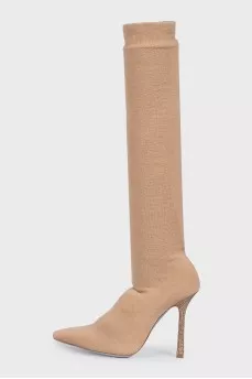 Beige textile boots with a decorated heel
