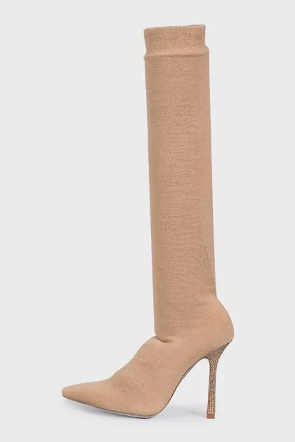 Beige textile boots with a decorated heel