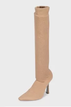 Beige textile boots with a decorated heel