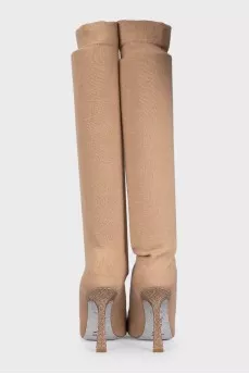 Beige textile boots with a decorated heel