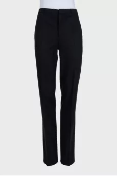 Black straight-leg trousers with creases