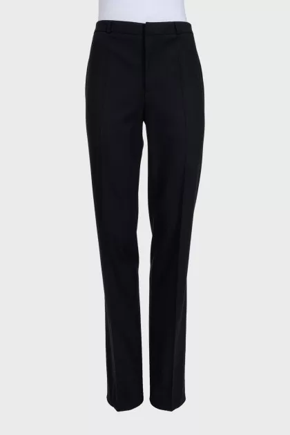 Black straight-leg trousers with creases