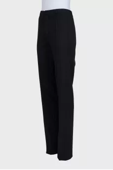 Black straight-leg trousers with creases