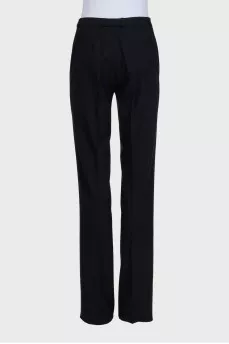 Black straight-leg trousers with creases