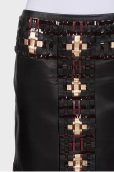 Black leather skirt with braiding