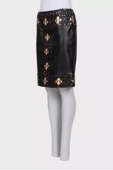 Black leather skirt with braiding