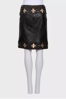 Black leather skirt with braiding