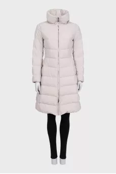 A fitted, elongated down jacket with a zipper