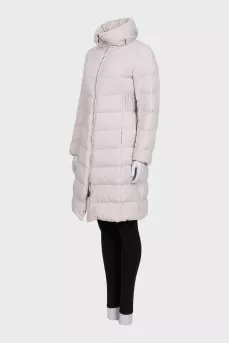 A fitted, elongated down jacket with a zipper
