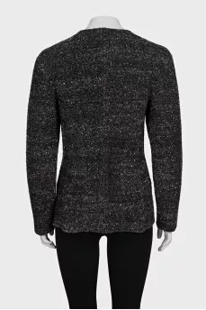 Tweed jacket with diagonal fastening