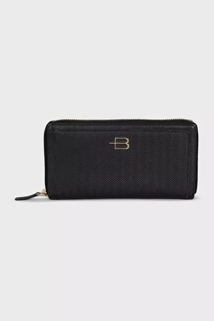 Black leather wallet with tag