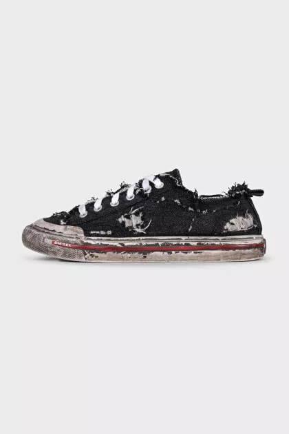 Textile sneakers with a distressed effect