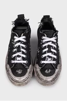 Textile sneakers with a distressed effect