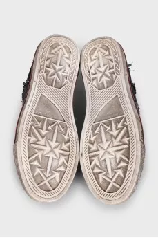 Textile sneakers with a distressed effect
