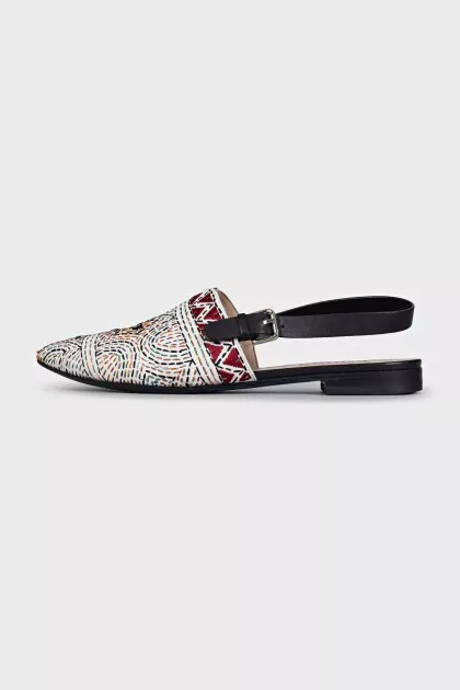 White slingbacks with multi-colored embroidery