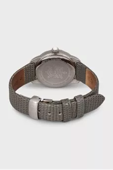 Silver watch with a green leather strap