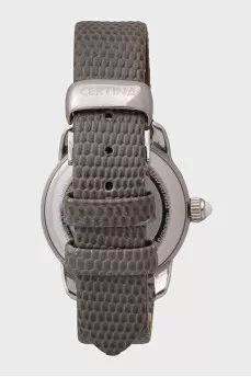 Silver watch with a green leather strap