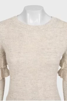 Beige shiny sweater with ruffles