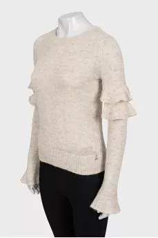 Beige shiny sweater with ruffles