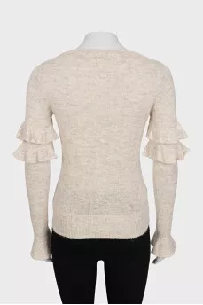 Beige shiny sweater with ruffles