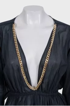 Fitted dress decorated with chain
