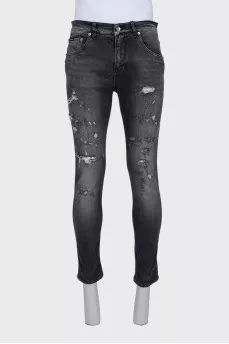 Dark gray slim fit jeans with a distressed effect