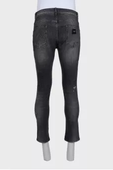 Dark gray slim fit jeans with a distressed effect