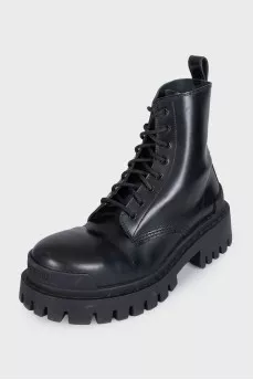 Black leather boots with chunky soles