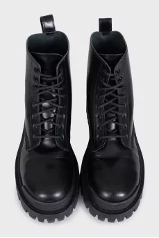 Black leather boots with chunky soles