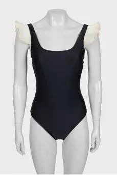 Black ruffled swimsuit with tag