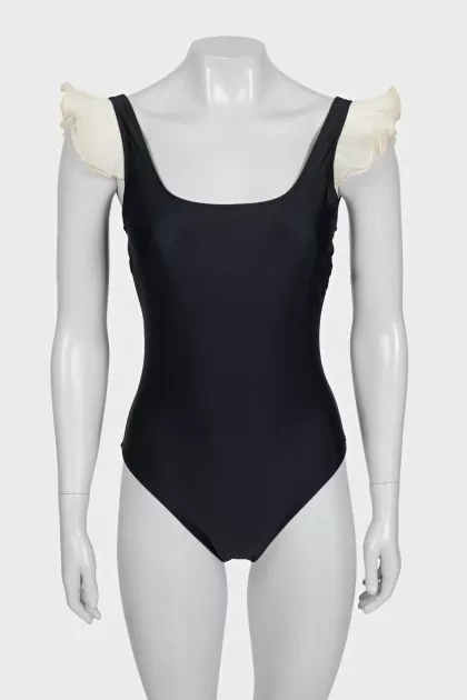 Black ruffled swimsuit with tag