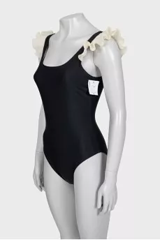Black ruffled swimsuit with tag