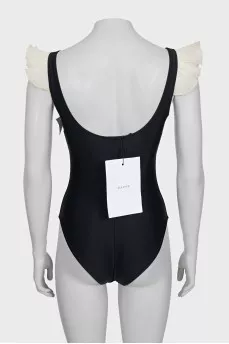 Black ruffled swimsuit with tag