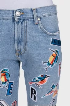 Light blue straight jeans with bright stripes