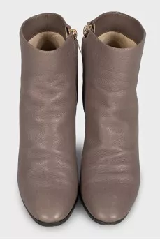 Gray ankle boots with a gold zipper
