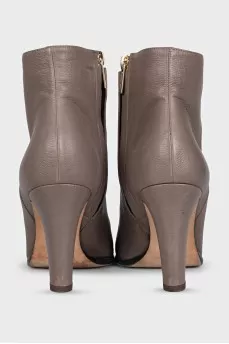 Gray ankle boots with a gold zipper