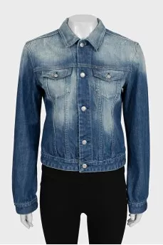 Blue cropped denim jacket with a distressed effect