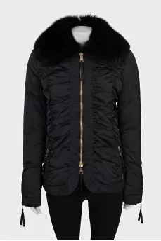 Black fitted down jacket with a fur collar