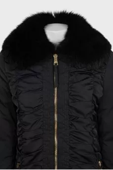 Black fitted down jacket with a fur collar