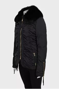 Black fitted down jacket with a fur collar