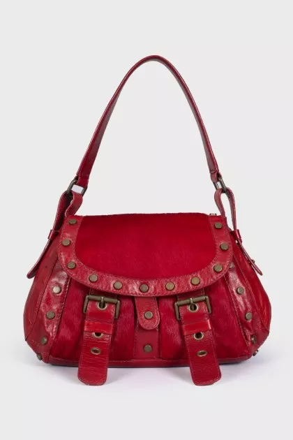 Bag made of fleecy leather decorated with rivets