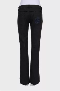 Black straight trousers with embroidery on the pocket