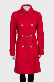 Double-breasted trench coat in red