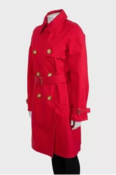 Double-breasted trench coat in red