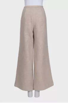 Beige wide-leg trousers with a zipper